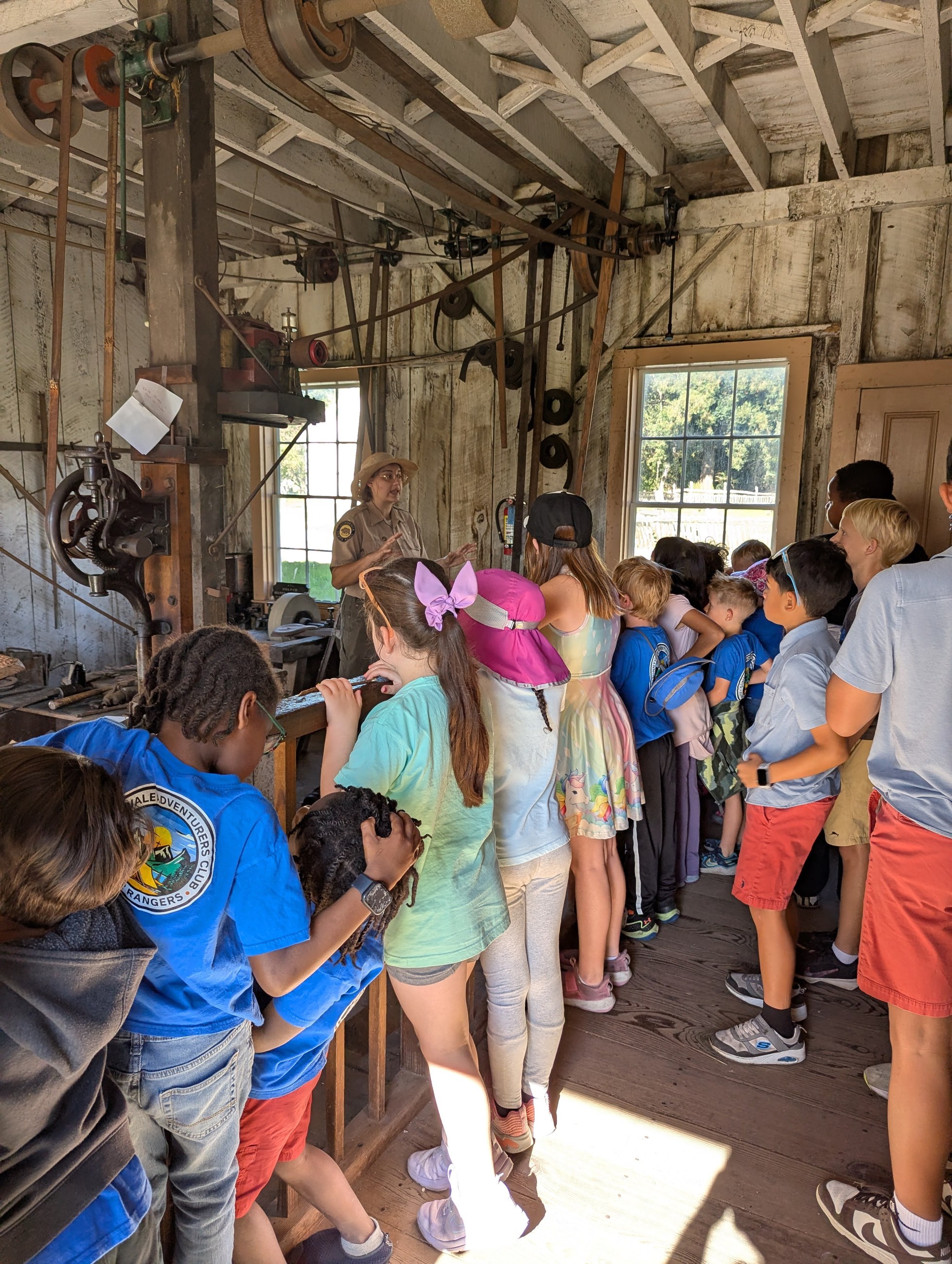 Adventurers learning from a ranger